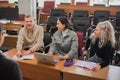 The teacher and students communicate in sign language in the classroom. Hearing impaired and deaf people Royalty Free Stock Photo