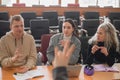 The teacher and students communicate in sign language in the classroom. Hearing impaired and deaf people Royalty Free Stock Photo