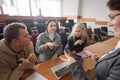 The teacher and students communicate in sign language in the classroom. Hearing impaired and deaf people Royalty Free Stock Photo