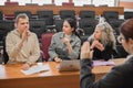 The teacher and students communicate in sign language in the classroom. Hearing impaired and deaf people Royalty Free Stock Photo