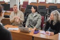 The teacher and students communicate in sign language in the classroom. Hearing impaired and deaf people Royalty Free Stock Photo