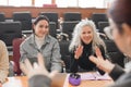 The teacher and students communicate in sign language in the classroom. Hearing impaired and deaf people Royalty Free Stock Photo