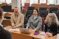 The teacher and students communicate in sign language in the classroom. Hearing impaired and deaf people Royalty Free Stock Photo