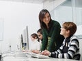 Teacher and students in computer class Royalty Free Stock Photo