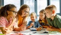 Teacher and students on lesson together at school