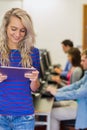 Teacher with students using computers in computer room Royalty Free Stock Photo