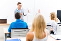 Teacher talking with students Royalty Free Stock Photo