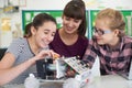 Teacher Talking To Female Pupils Studying Robotics In Science Le Royalty Free Stock Photo