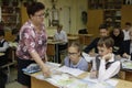 School teacher teaches children of primary school