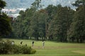 The teacher teaches children to play golf Royalty Free Stock Photo