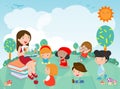 Teacher telling a story to nursery children in the garden, cute Kids Listening to Their teacher Tell a Story, teacher reading book Royalty Free Stock Photo