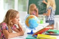 Teacher with two schoolgirls Royalty Free Stock Photo