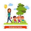 teacher walking with kids Royalty Free Stock Photo