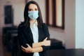 Teacher Wearing face Mask Sitting in Front of the Classroom