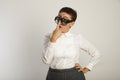 Teacher in white blouse with 3 pairs of glasses Royalty Free Stock Photo