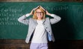 Teacher woman with book chalkboard background. Why teacher quit off sick with stress. School daily routine. Teacher Royalty Free Stock Photo