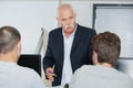 Teacher with young people in computing class Royalty Free Stock Photo