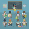Teachers day background. School lesson. Little students and african american teacher in a classroom.
