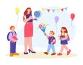 Teachers day. Kindergarten teacher and little happy child with flowers. Smiling kids give gifts to young woman. Birthday Royalty Free Stock Photo