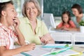 Teachers working with pupils Royalty Free Stock Photo