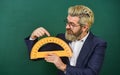 Teaching about angles. Mathematics and people concept. Mathematics favorite subject. Man teacher use math rule tool Royalty Free Stock Photo