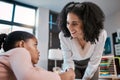 Teaching, black woman teacher and child education, support and helping with learning development. Classroom, knowledge Royalty Free Stock Photo