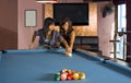 Teaching how to play pool Royalty Free Stock Photo