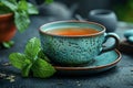 a teacup is filled with tea, mint and tea leaves, in the style of black and amber, clear edge definition, rough hewn