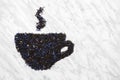 Teacup made of Black Earl gray tea leaves Royalty Free Stock Photo