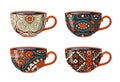 Teacups with decorative ethnic ornaments. Set of four cups