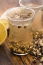 Teaglass with yellowhead root tea Royalty Free Stock Photo