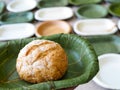 Teak , betel palm leaf dish plate organic pure green whole wheat bread bun nature natural selected focus