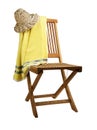 Teak deck chair with towel and hat