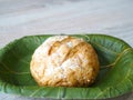 Teak leaf dish plate organic pure green whole wheat bread bun nature natural selected focus Royalty Free Stock Photo