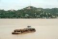 Teak logs in timber on boat in Ayeyarwaddy river,Myanmar. Royalty Free Stock Photo