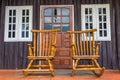 Teak wood chair with window and door