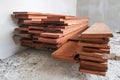 Teak wood piles sawed in storage