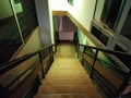 Teak wood Staircase. Interior - wood stairs and metal handrail