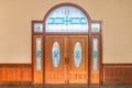 Teak wooden door with beautiful stained glass interior for home and living architecture vintage decoration cllassic building