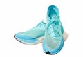 Teal aqua running shoes isolated on white front horizon view