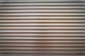 Teal brown painted horizontal metal window roller shutter blinds or garage doors background texture Royalty Free Stock Photo