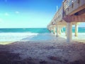 Teal ocean and pier