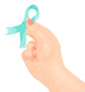 Teal ribbon in hand as symbol of scleroderma, ovarian cancer, food allergy