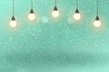 Teal, sea-green cute bright glitter lights defocused light bulbs bokeh abstract background with sparks fly, holiday mockup texture