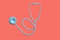 Teal stethoscope on pink background. 3D illustration Royalty Free Stock Photo