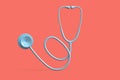 Teal stethoscope on pink background. 3D illustration