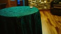 Teal table cloth, candle, spa room, background lights, event Royalty Free Stock Photo