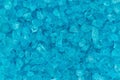 Teal textured beach glass closeup background