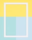 teal and yellow paper flat lay background. Minimalism, geometry and symmetry template with empty picture frame mock up.