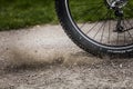 Tealby, Lincolnshire, UK, July 2017, Bike tire kicking up stones